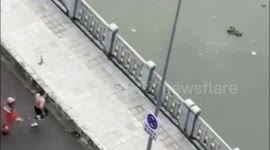 China: Firefighters Rescue Man on Brink of Suicide in Ningbo