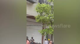 Brave man risks life to rescue six-year-old girl dangling from second-floor window