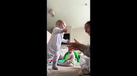 Mom is super proud of 11-month-old son as he tries to walk on his own