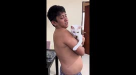 Protective pet cat pounces woman to defend owner
