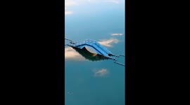 Lake in China's Anhui displays dreamy mirror-like scenery