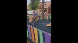 Man's failed attempt to ride a spring rocker becomes a hilarious moment during the family holiday.