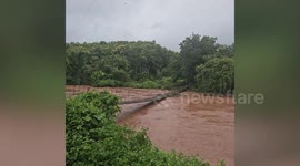 Bridge collapses into river amid heavy rain in Thailand
