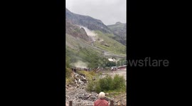 Terrified tourists shout 'landslide! run!' as massive boulders crash down mountainside in China