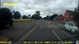 Child runs out into live lane of moving traffic caught on dashcam