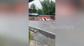House collapses as flood erodes its foundation in Thailand