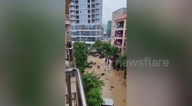 Floods swamp streets in Laos as region is battered by monsoons