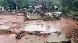 Bridge collapses in flood leaving villagers stranded in Thailand