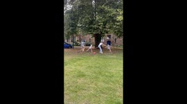 Dog joins tug of war game in Worcester, UK