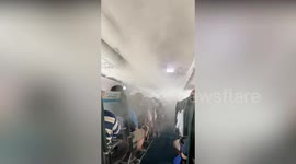 Shocking moment smoke appears to fill passenger plane cabin