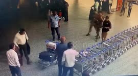 Airport security guards save passenger who collapsed with heart attack
