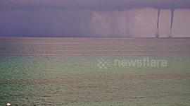 Double waterspout tornado forms in Palm Beach, Florida