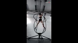 Acrobat artist dedicates time to perfect twists and spins with new carousel prop