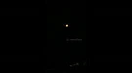 Rocket debris lights up night sky in Laoag City, Philippines