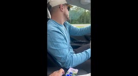 Girl halts boyfriend's singing on the road trip, leaving him confused