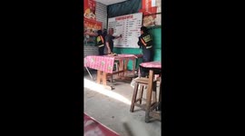 Firemen catch python in Thai streetside restaurant