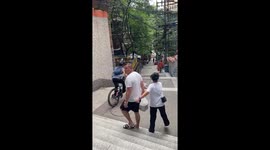 Teenager riding down steps flung over bike handlebars