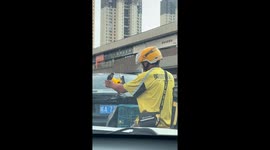 Pet bird joins delivery rider owner for a ride