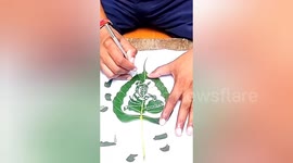 India: Sand Artist carved a picture of Krishna's childhood on green Pippal leaves, noted Congratulations on Krishna Ashtami