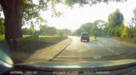 4x4 Nearly takes cyclist out on roundabout!