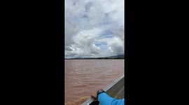 Flock of ducks cruise through floods in northern Thailand