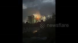 UK: Hundreds Of Firefighters Attend Flats Blaze