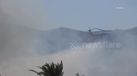 USA: Jurupa Valley Brush Fire Helicopter Water Drops Part 2
