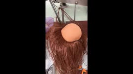 Machine Gives Doll Full Head of Hair