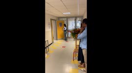 Woman Takes Door Handle With Her Leaving Exam