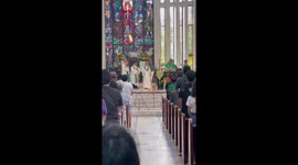 Pet Golden Retriever joins priest giving mass