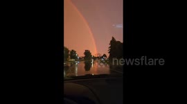 Lightning and rainbow dazzle in sky at same time over Minnesota