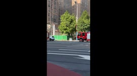 Passengers rescued from burning electric car in China