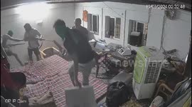 Chilling moment armed robbers raid storage office and steal cash