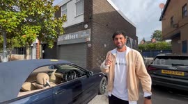 Oasis fans gather at music shop where Gallaghers bought records from as kids