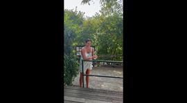 Girl's attempt to open a wine bottle in ends with breaking the bottle
