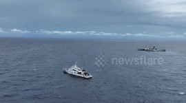 Chinese Coast Guard vessel 'threatens Filipino ship with water cannon' amid South China Sea dispute