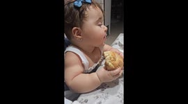 Sleepy Baby Eats a Snack