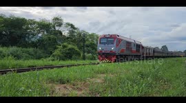 The overnight sleeper train 14 Chiang Mai to Bangkok gathers speed after departing Chiang Mai