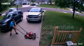 Lucky opossum avoids serious injury by falling out of lawnmower as it's turned on