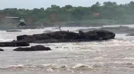 Helicopter rescues walker stranded on rocks for 30 hours during floods