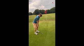 Boy accidentally destroys golf club due to being carried away with swing attempt