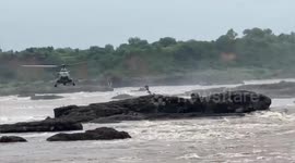 Indian Airforce Force Helicopter rescued walker stranded on rocks for 30 hours during floods in Gujarat, India