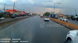 Pickup truck spins out of control on wet road