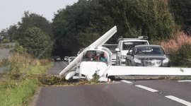 Pilot and passenger have miracle escape after aircraft crashes into road