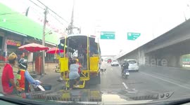 Fare dodging stray dog kicked off bus in Thailand