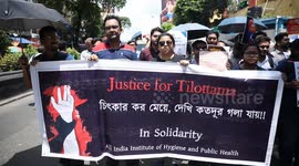 Junior doctors and medical students take part in a protest march against the rape and murder of a PGT woman doctor at Government-run R G Kar Medical College & Hospital, in Kolkata, India