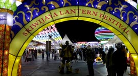 lluminated decorations are seen at Sriwijaya Lantern Festival at Matreyawira building in Palembang, Indonesia on August 28, 2024. Sriwijaya Lantern Festival is decorated with thousands of lanterns with various themes such as the Ampera Bridge which is an