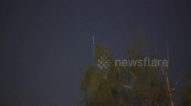 Starlink satellite train dazzles as it ascends over Swiss Alps
