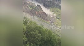Massive boulders topple down mountain heading towards packed touristtrail