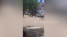 Shocking video of 'machete-wielding thug bashing shop where rival is hiding'
